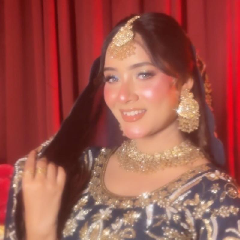 Close framing of a bridal makeup look with henna by Saniya Gaffar