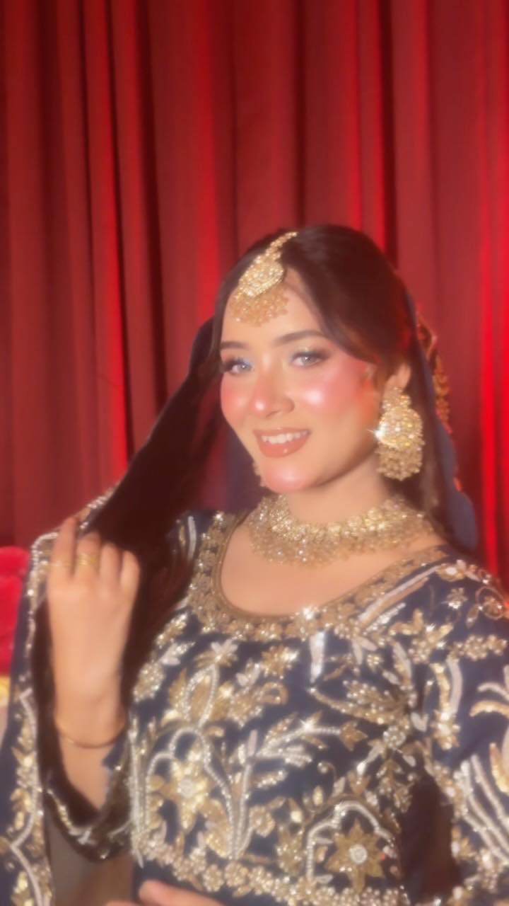 Bridal makeup look with henna for a 2026–27 booking